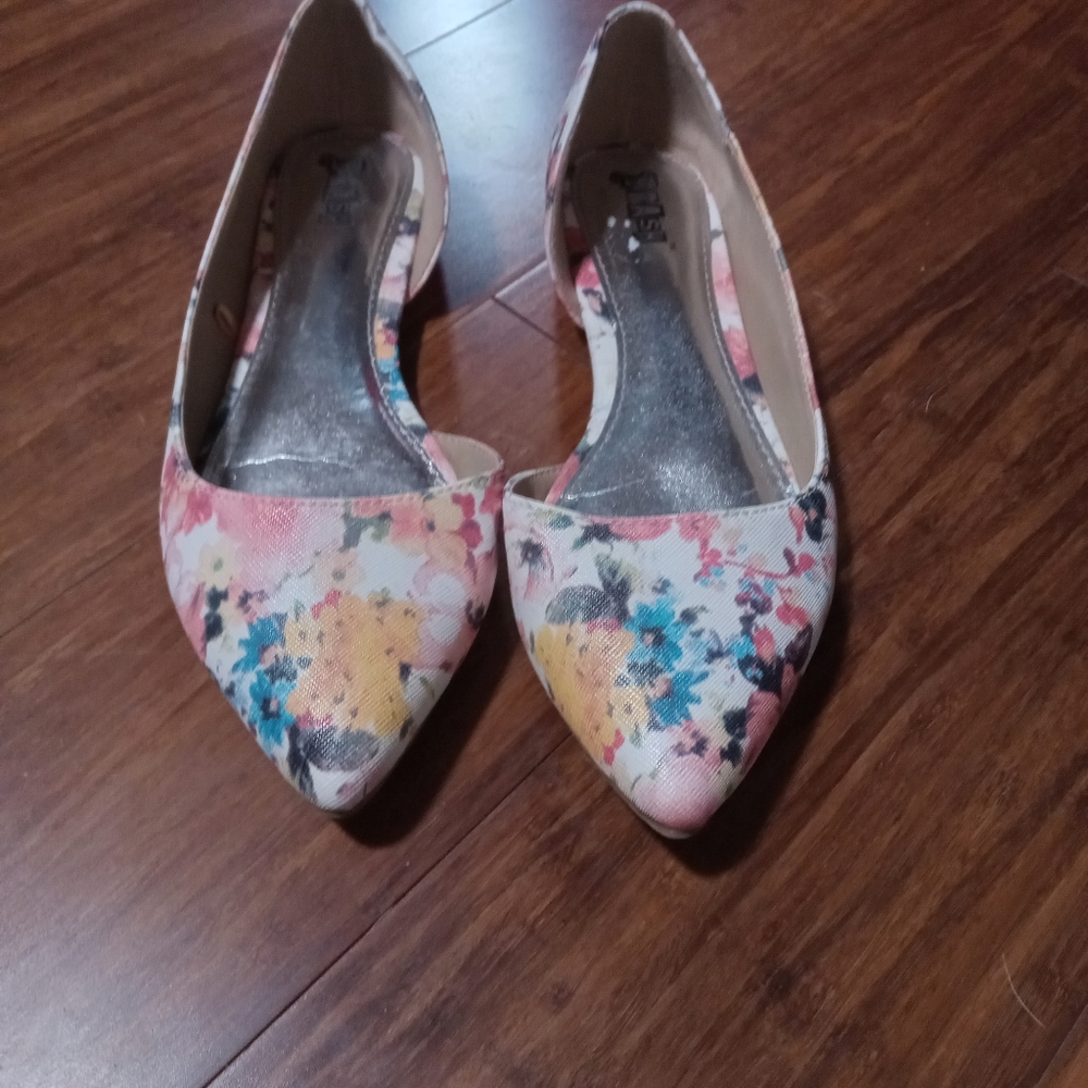 Brash floral flats.
